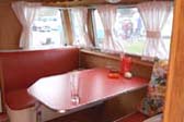 Welcoming Dining area in 1956 Shasta model 1400 trailer